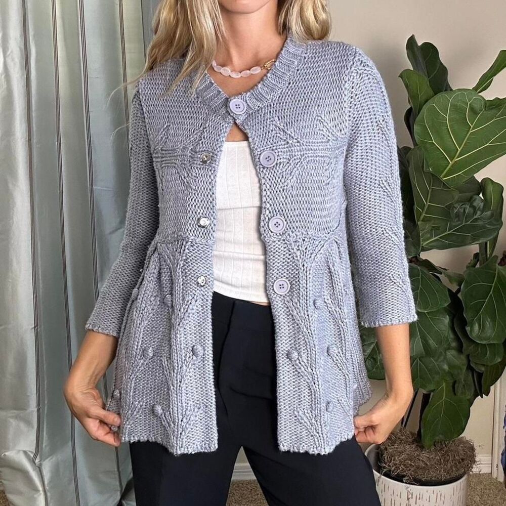 Grey chunky knit cardigan sweater with a button down fron